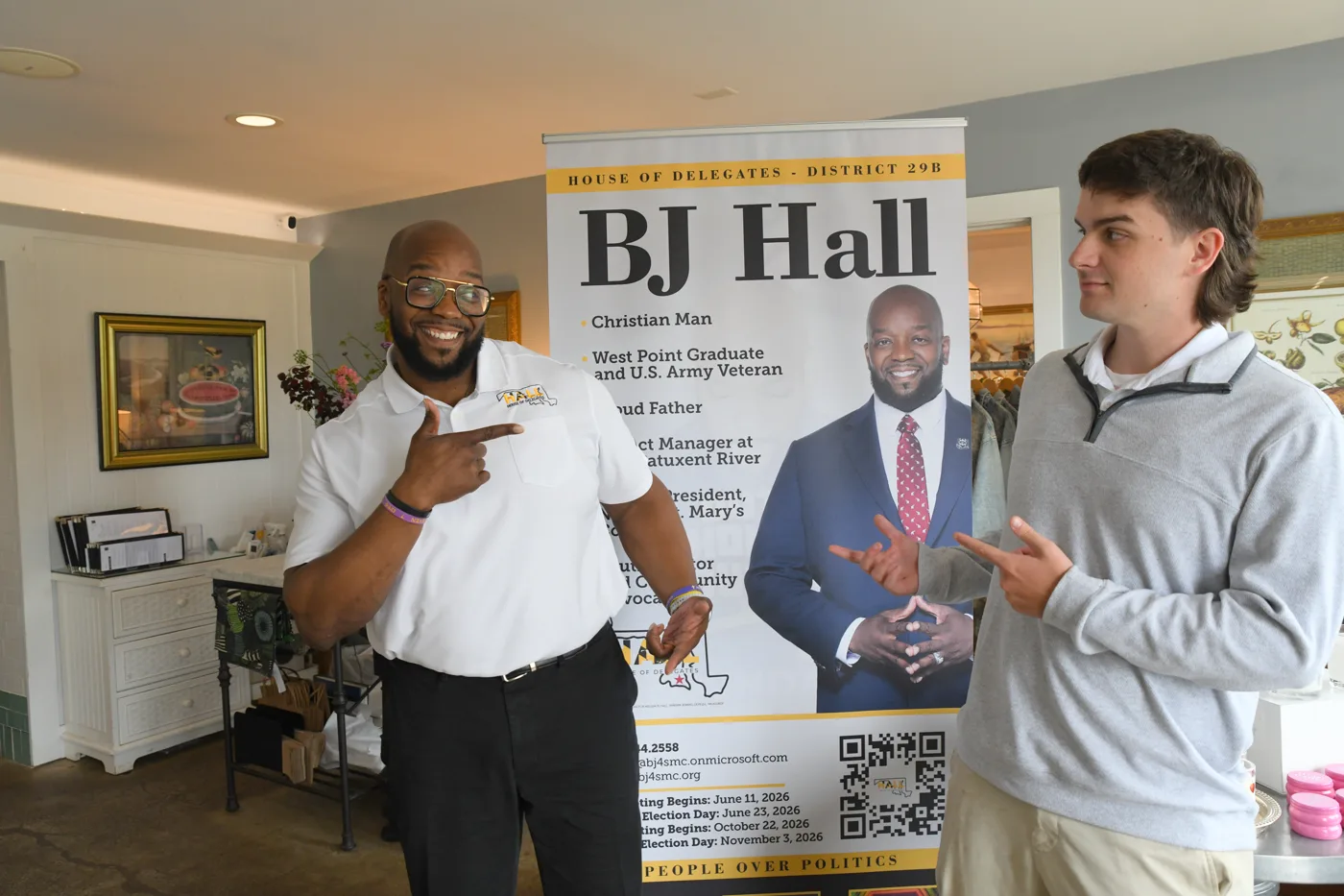 BJ Hall talking with a young community member